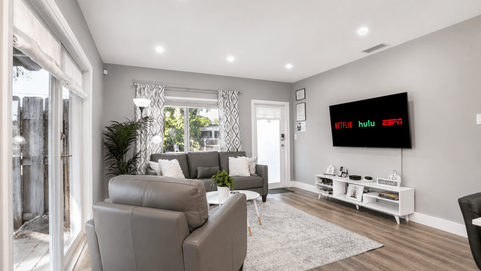 Living room with streaming-ready TV and lounge seating